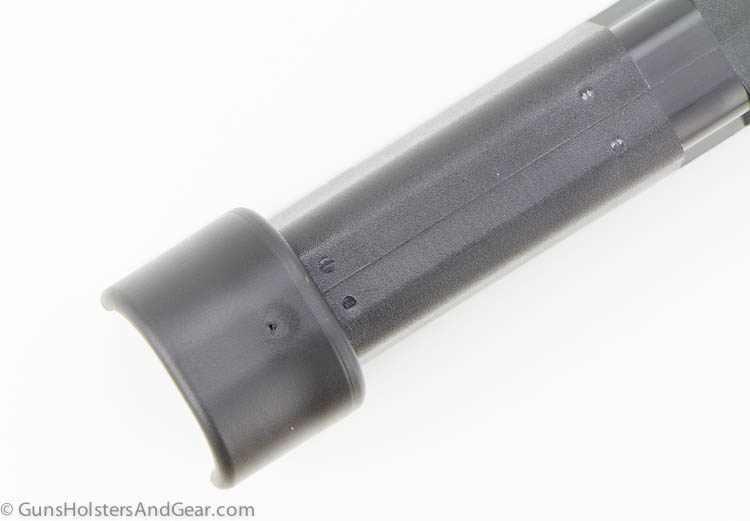 In this image, we see the Finger Extension on the pistol magazine. A magazine, often simply called a mag, is an ammunition storage and feeding device for a repeating firearm, either integral within the gun or externally attached. This one is designed to feed 9mm cartridges into the Glock 43 handgun. The 9×19mm Parabellum is a rimless, tapered firearms cartridge. Originally designed by Austrian firearm designer Georg Luger in 1901, it is widely considered the most popular handgun and submachine gun cartridge due to its low cost, adequate stopping power and extensive availability.