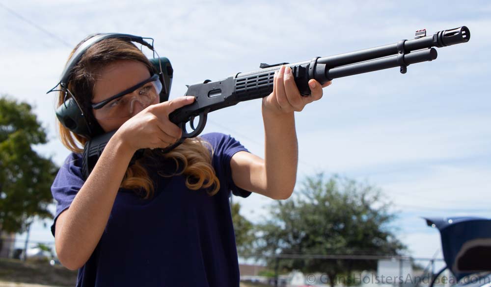 Beautiful Woman Shooting Mossberg Lever Action Rifle