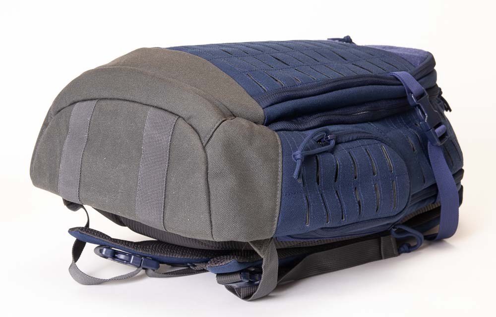 indigo blue and gray colored backpack